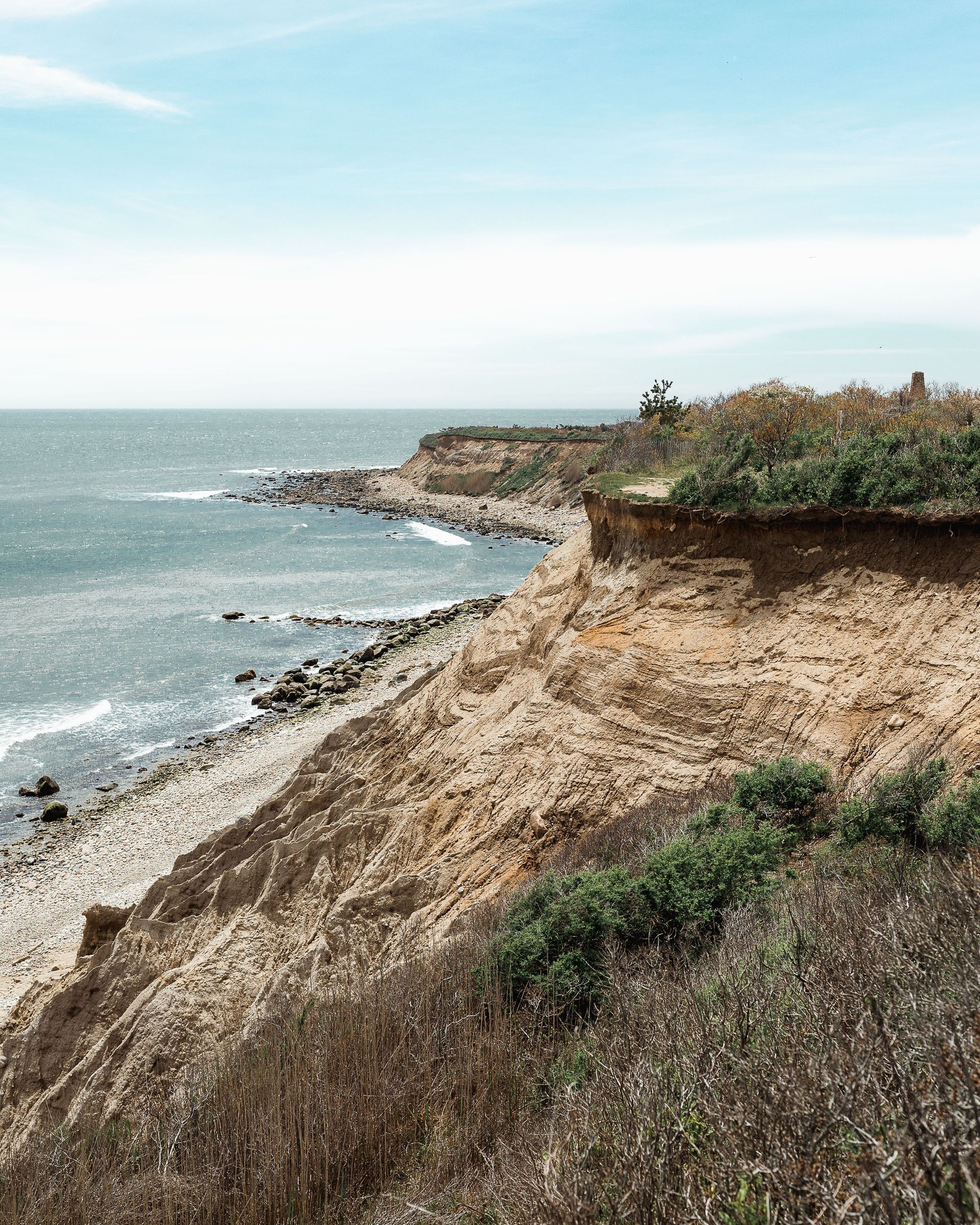 Stunning coastal cliffs and ocean view photographed at Montauk, NY, capturing a serene and dramatic landscape.